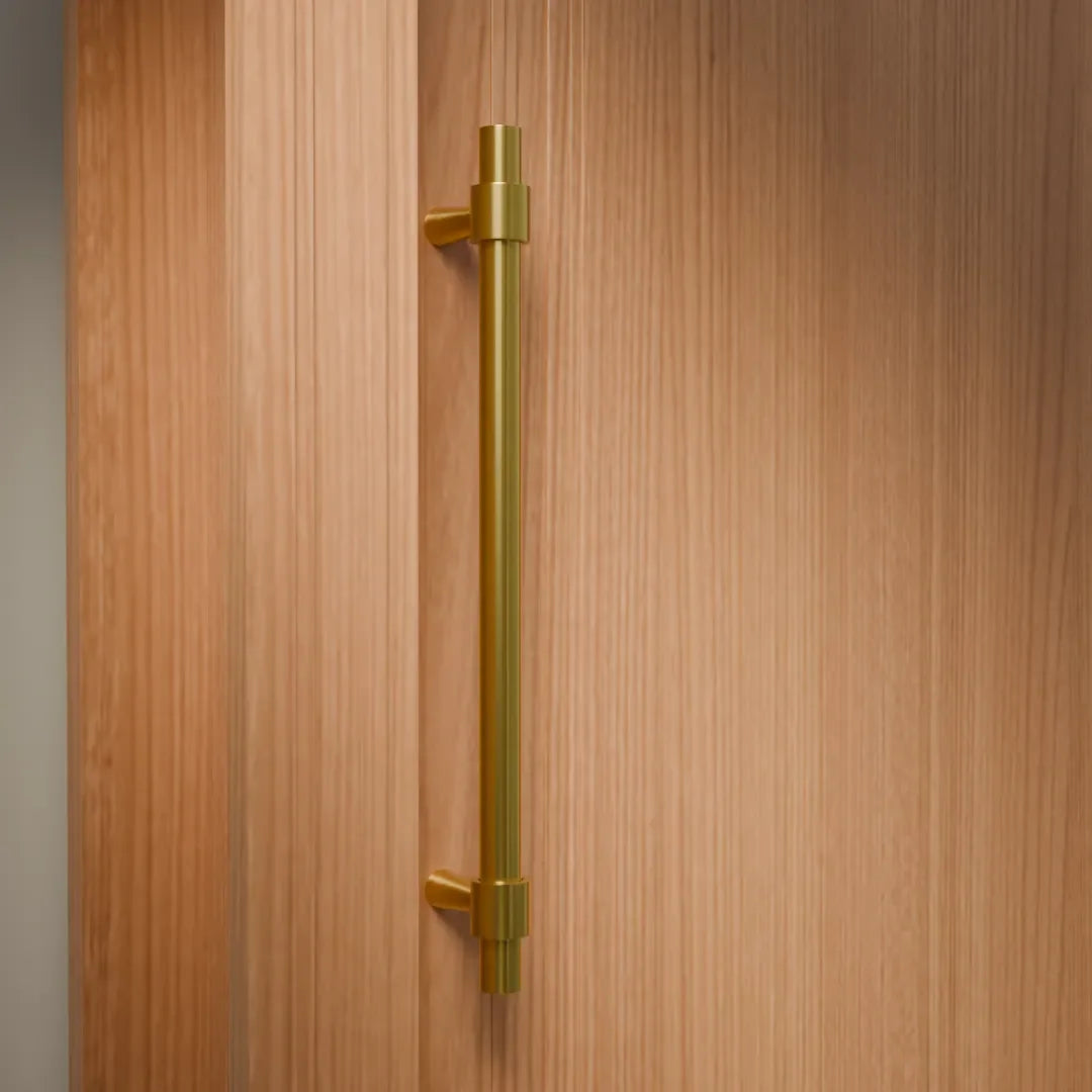 Mantara Seraphine Handle B-0054 is a modern brushed brass handle in gold, ideal for wardrobes, almirahs, and kitchens.