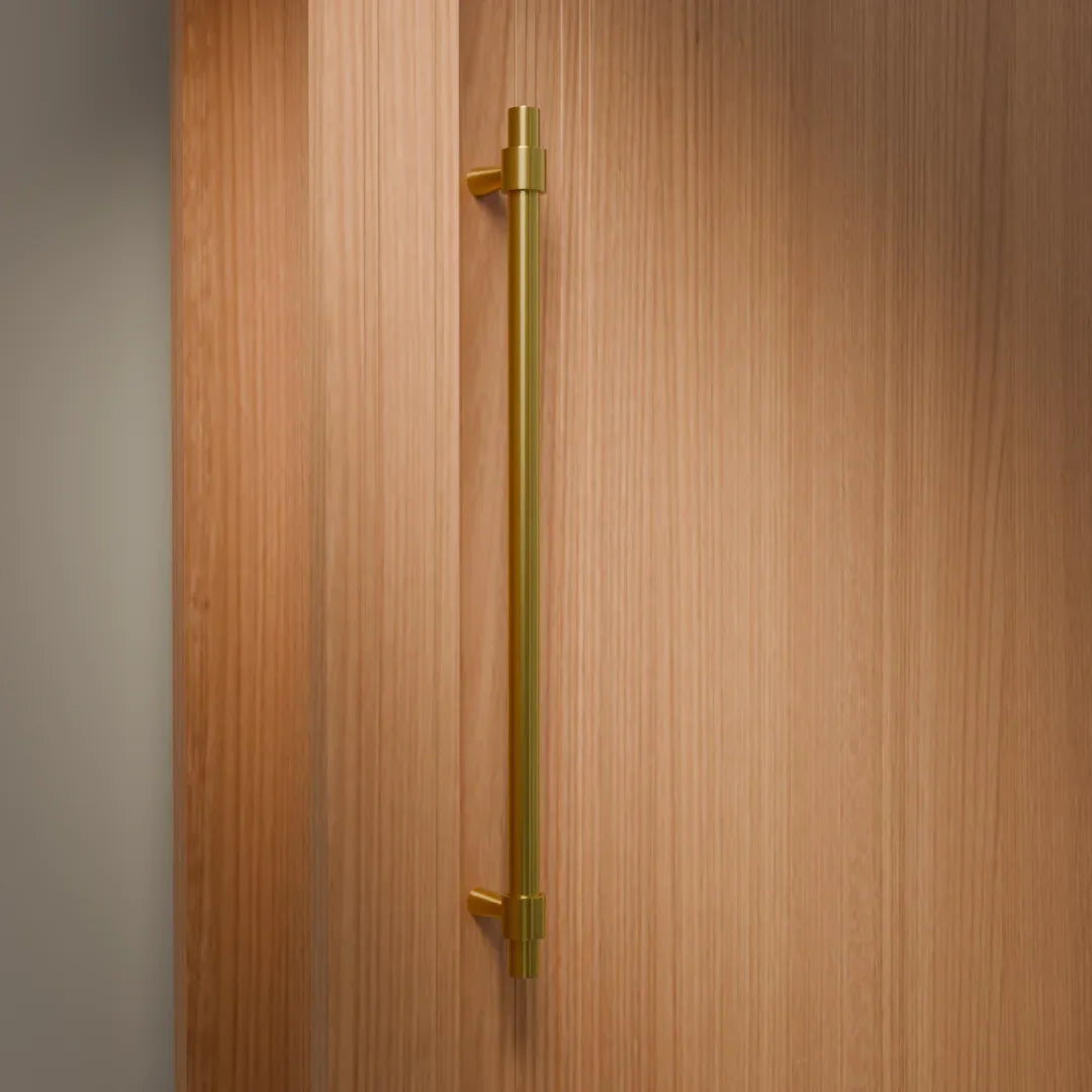 Mantara Seraphine Handle B-0054 is a modern brushed brass handle in gold, ideal for wardrobes, almirahs, and kitchens.