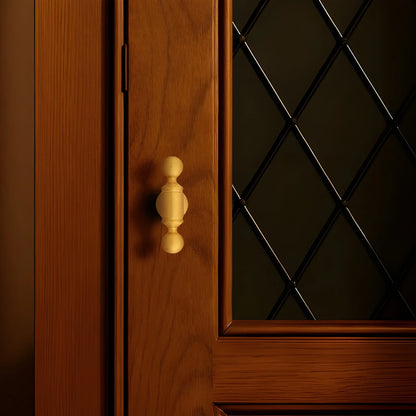 The Mantara B-0127 Caelum Handle is a modern brass handle in bronze and gold, perfect for kitchen drawers, cabinets, and furniture.