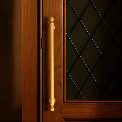 The Mantara B-0127 Caelum Handle is a modern brass handle in bronze and gold, perfect for kitchen drawers, cabinets, and furniture.