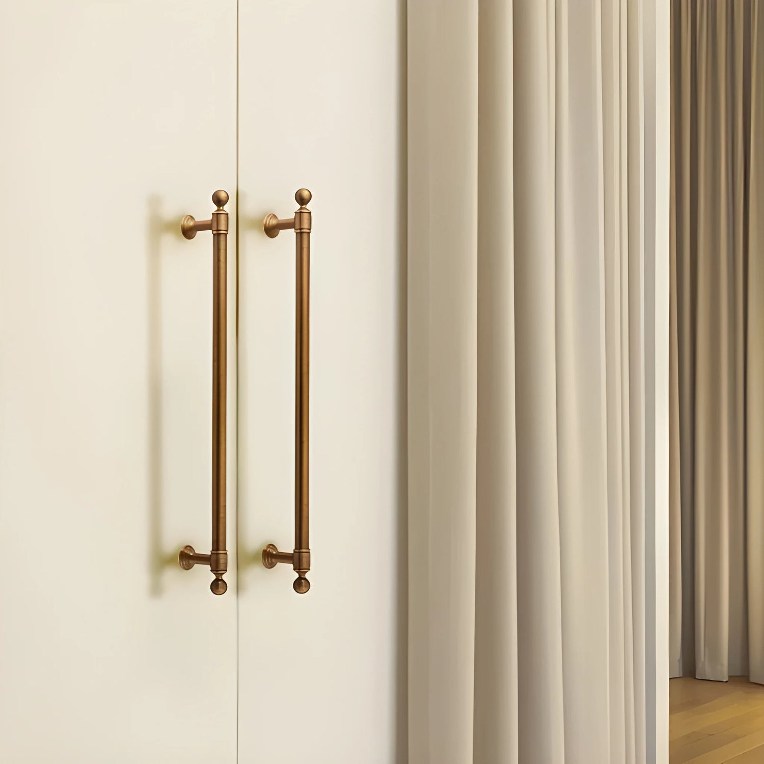 The Mantara B-0127 Caelum Handle is a modern brass handle in bronze and gold, perfect for kitchen drawers, cabinets, and furniture.