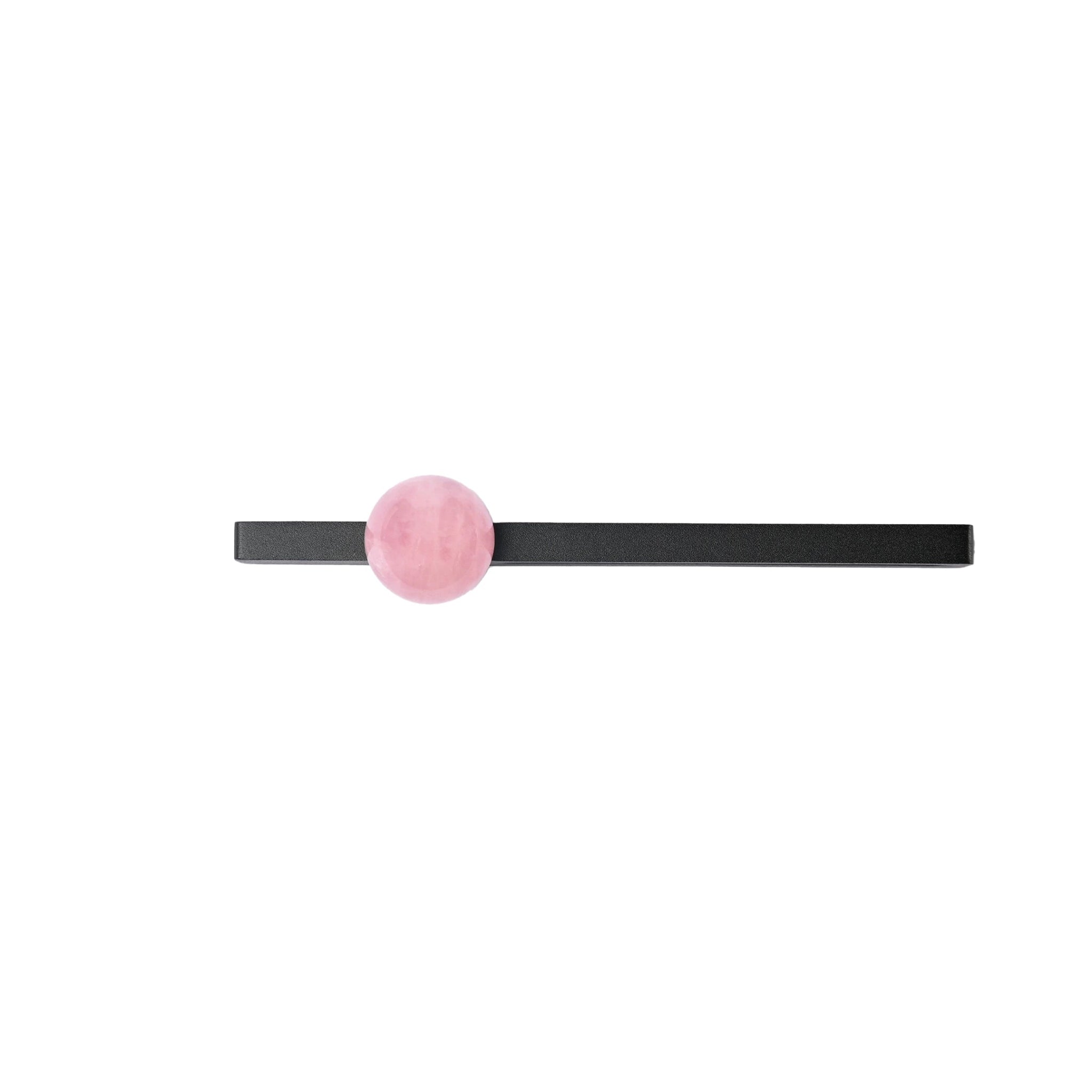The Mantara C-0027 Calyx Handle is a modern crystal handle in black and pink, ideal for cabinets, wardrobes, and drawers.