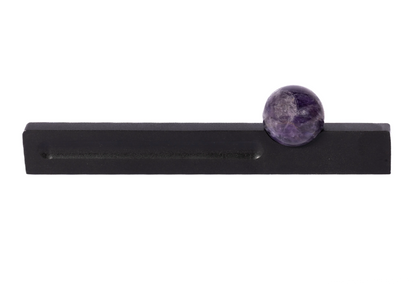 The Mantara C-0027 Calyx Handle is a modern crystal handle in black+purple, ideal for cabinets, wardrobes, and drawers.
