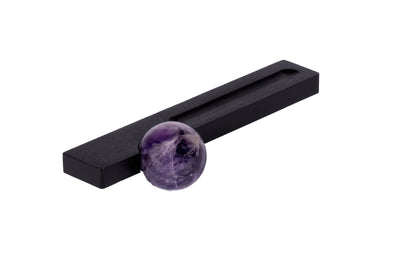 The Mantara C-0027 Calyx Handle is a modern crystal handle in black+purple, ideal for cabinets, wardrobes, and drawers.
