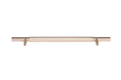 The Mantara AL-0018 Caro Handle is a modern aluminum alloy handle in gold with a brushed finish, ideal for drawers and cabinets.