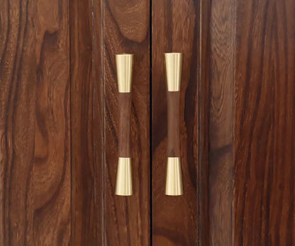 Furniture handle in brass and wood, featuring a tapered form in brown and gold finish, Sylvia Handle W-0014 by Mantara.