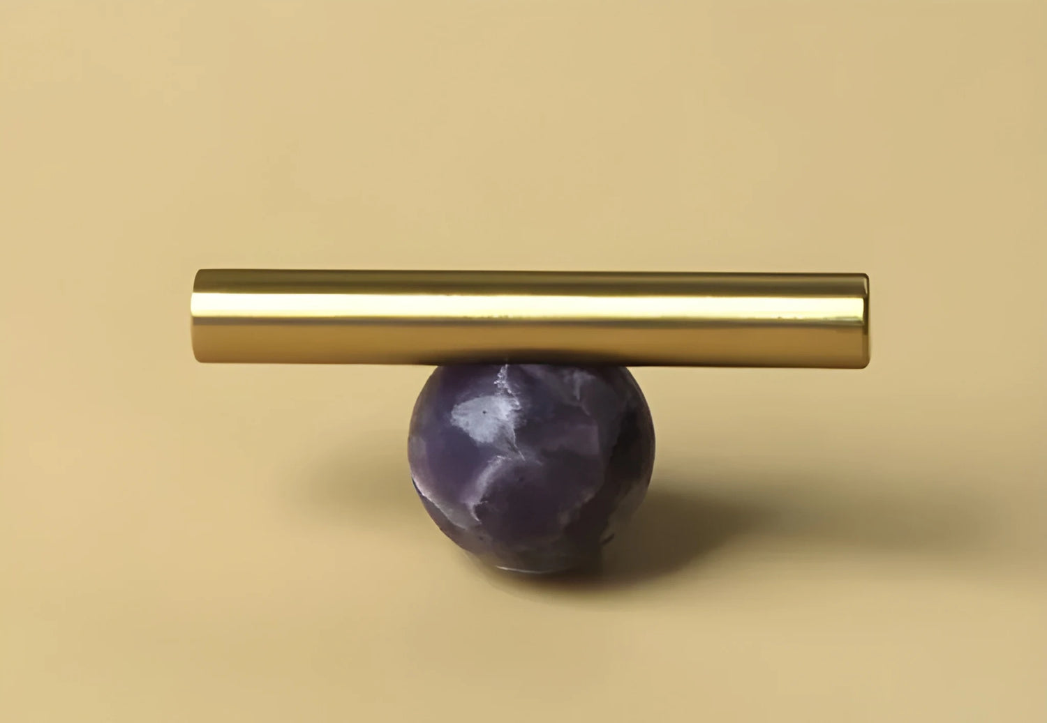 The Mantara C-0020 Chroma T-Bar is a modern crystal and brass knob in purple, ideal for drawers and cabinets.