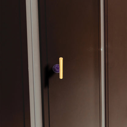 The Mantara C-0020 Chroma T-Bar is a modern crystal and brass knob in purple, ideal for drawers and cabinets.