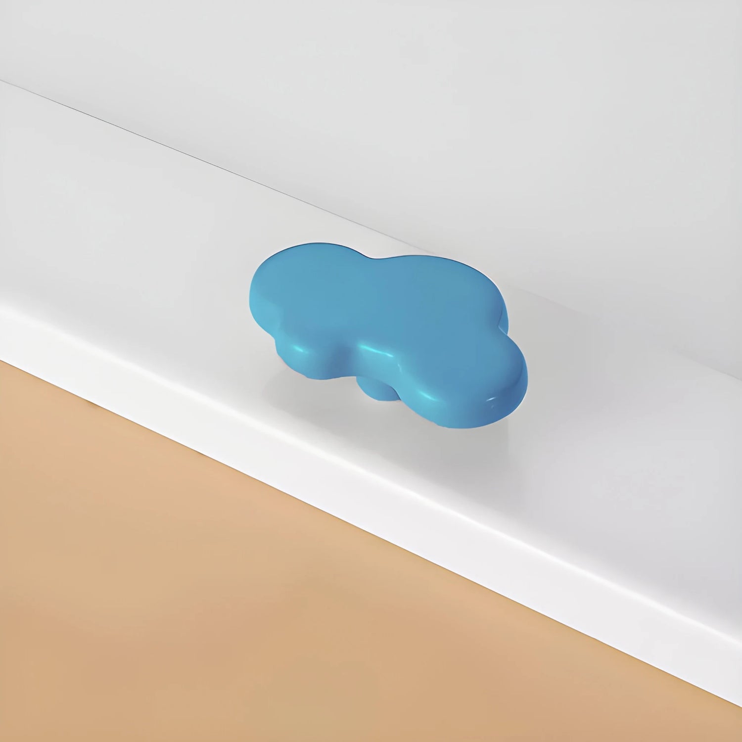 The Mantara CR-0003 Cloud Knob is a modern ceramic knob in blue with a polished finish, ideal for drawers, cabinets, and wardrobes.