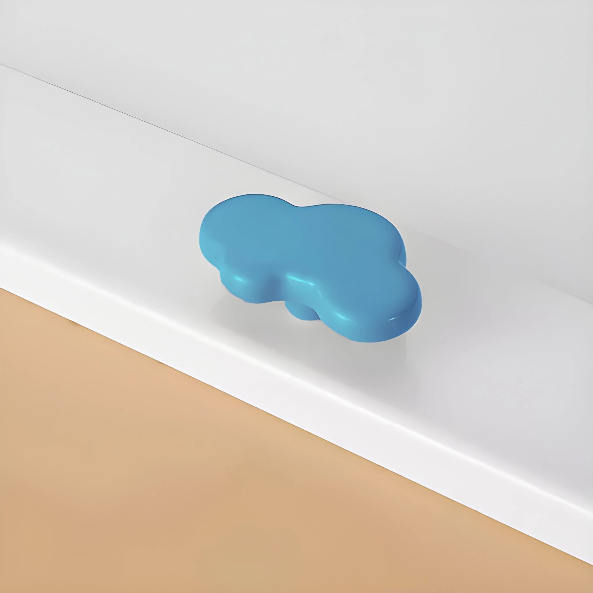 The Mantara CR-0003 Cloud Knob is a modern ceramic knob in blue with a polished finish, ideal for drawers, cabinets, and wardrobes.