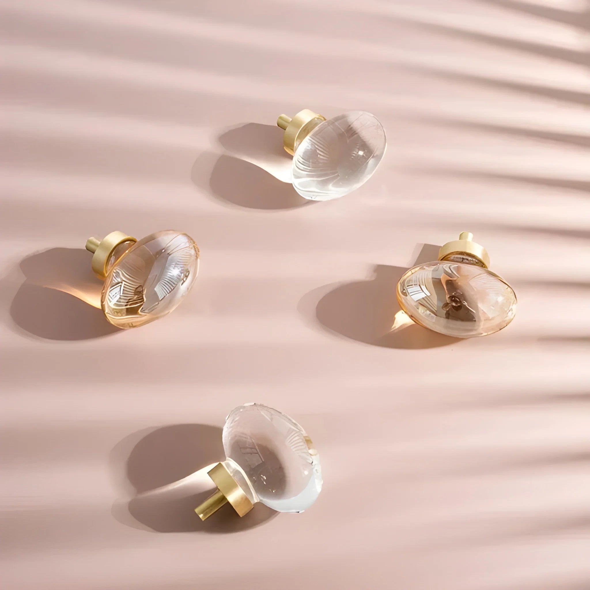 The Mantara C-0008 is a modern artificial crystal + brass knob in champange/brass, ideal for wardrobes and drawers.