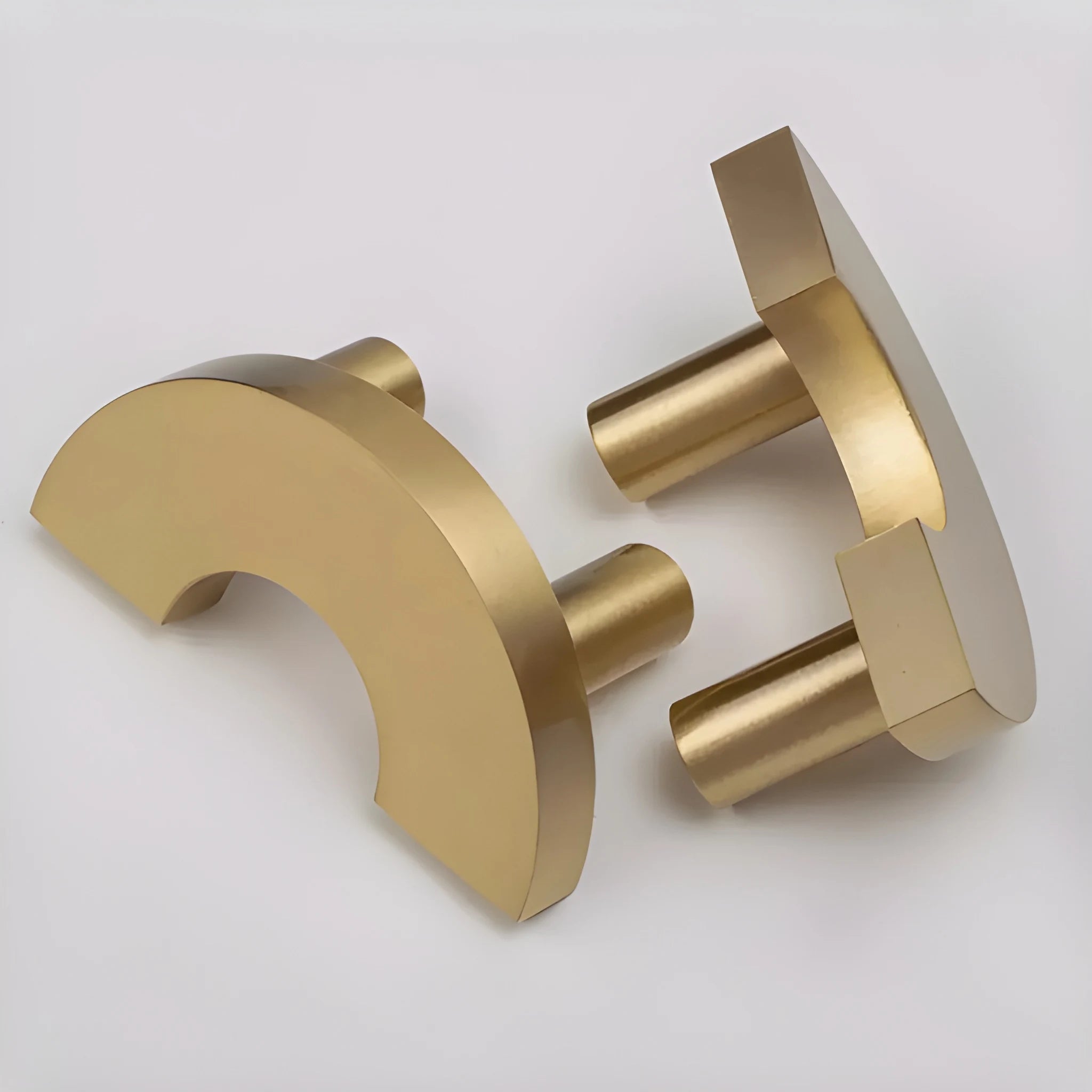 Mantara Dua Handle B-0075 is a modern brushed brass knob in gold, ideal for drawers, cabinets, and furniture use.