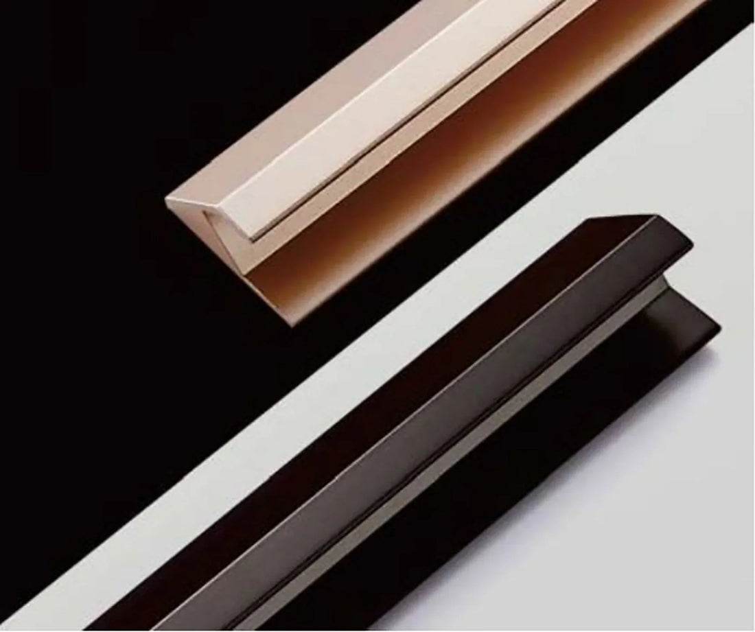 The Mantara AL-0009 Elara Handle is a modern aluminum handle in grey and gold with a brushed finish, perfect for kitchens and cabinets.