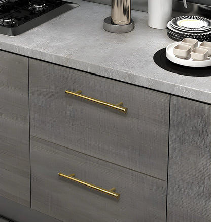 Mantara Eleanora Handle B-0058 is a modern solid brass handle in brushed gold, ideal for cabinets, doors, and wardrobes.