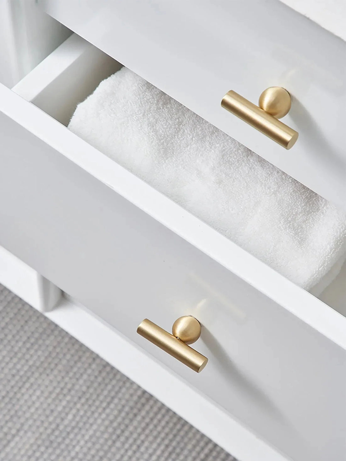 Mantara Elowen T Bar Handle B-0057 is a modern brushed brass handle in matte gold, ideal for cabinets and wardrobes.
