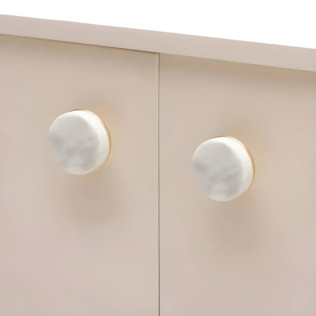 Mantara Elysian Knob M-0016 is a modern marble & brass knob in white,ideal for kitchen & dresser drawers.