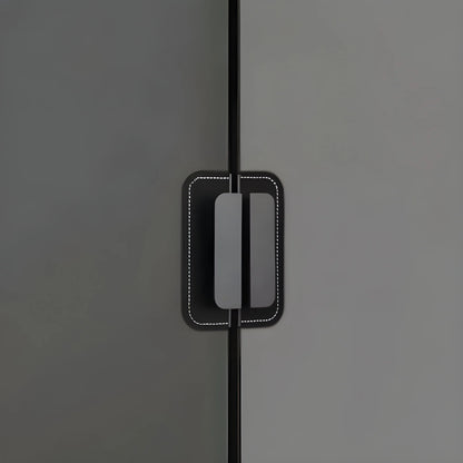 The Mantara L-0007 Geometry Leather Handle is a modern grey and black handle in matte finish, ideal for doors, cabinets, and wardrobes.