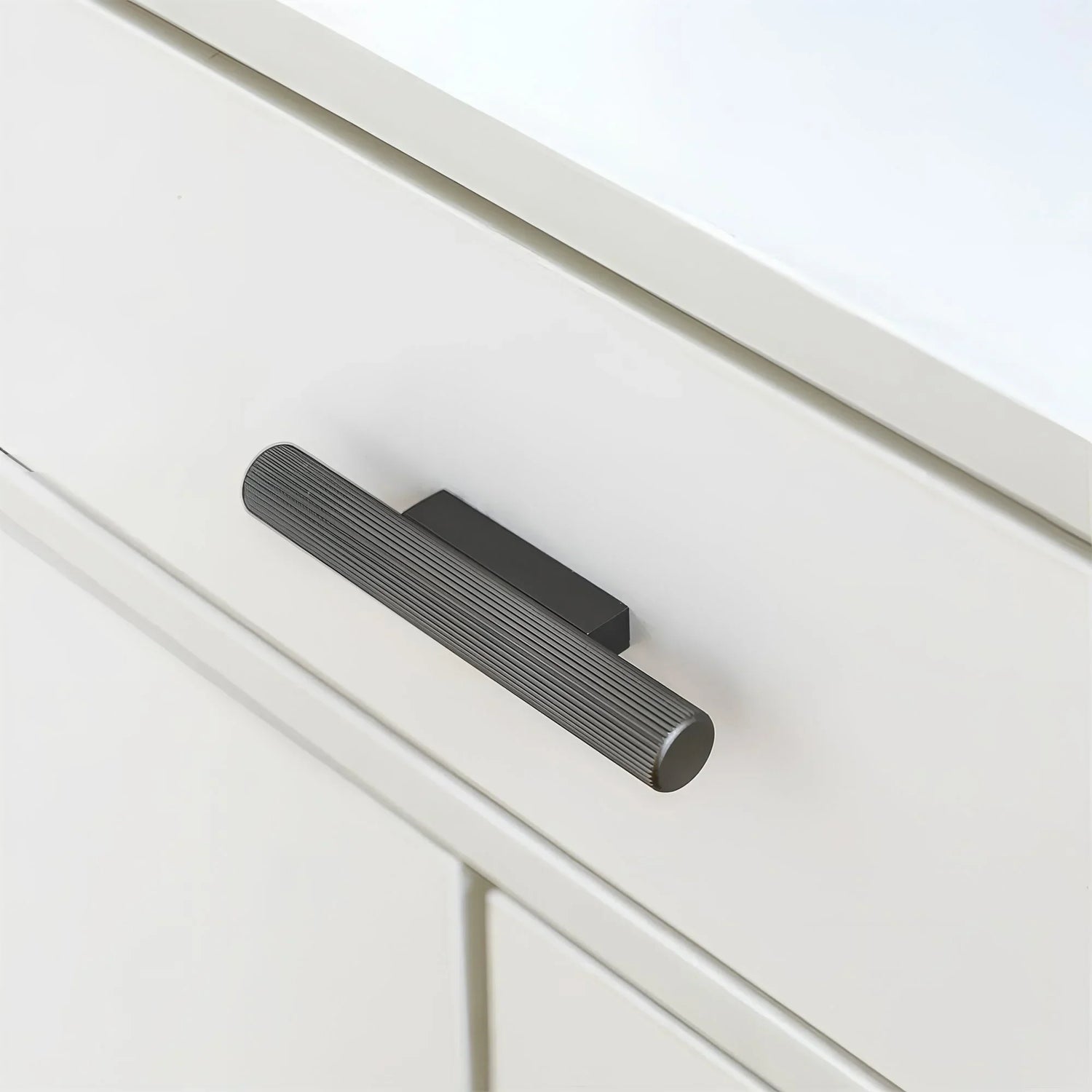 The Mantara AL-0012 Mara Handle is a modern aluminum handle in grey with a brushed finish, ideal for kitchens and drawers.