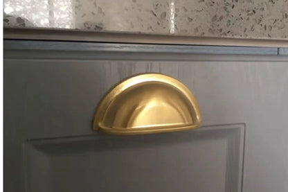 Mantara Exedra Pull Knob Matte Z-0003 is a modern zinc alloy knob in gold ideal for furniture and drawers.