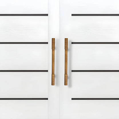 The Mantara B-0130 Ferra Handle is a modern brass handle in bronze finish, perfect for kitchen drawers, cabinets, and furniture.