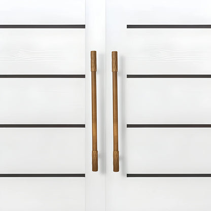 The Mantara B-0130 Ferra Handle is a modern brass handle in bronze finish, perfect for kitchen drawers, cabinets, and furniture.