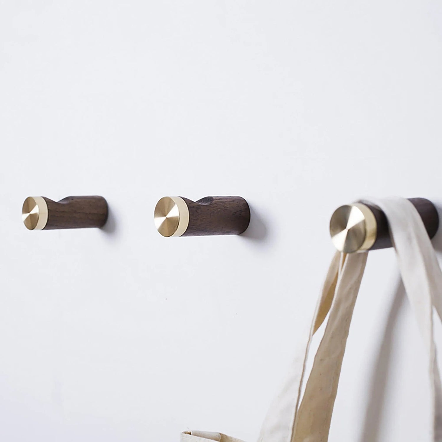 Flair Hook W-0013 in natural wood &amp; polished brass, size Dia30×H68mm, ideal for home &amp; hotel spaces—by Mantara.