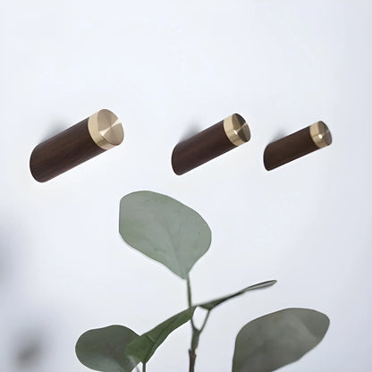 Mantara Flair Hook W-0013 is a natural wood &amp; brass wall hook in walnut  with polished finish, ideal for homes &amp; hotels.