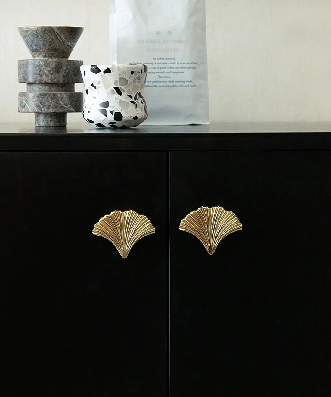 The Mantara B-0014 Floret Knob is a modern solid brass knob in brushed gold, ideal for doors, cabinets, and furniture.