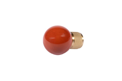 The Mantara C-0028 Geodelle Knob is a modern crystal knob in red, perfect for drawers, cabinets, and wardrobes.