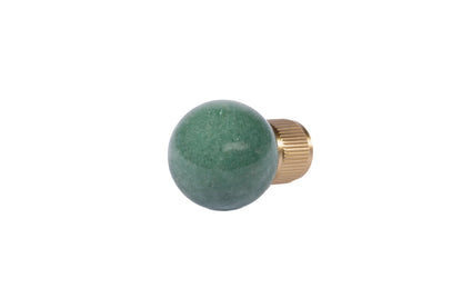 The Mantara C-0028 Geodelle Knob is a modern crystal knob in green, perfect for drawers, cabinets, and wardrobes.