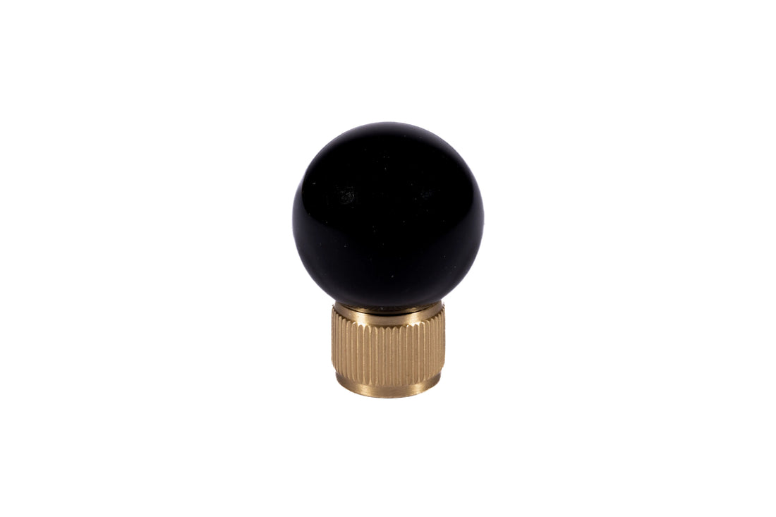 The Mantara C-0028 Geodelle Knob is a modern crystal knob in black, perfect for drawers, cabinets, and wardrobes.