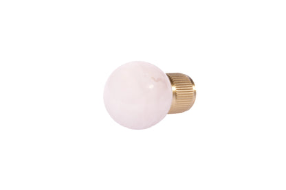 The Mantara C-0028 Geodelle Knob is a modern crystal knob in pink, perfect for drawers, cabinets, and wardrobes.