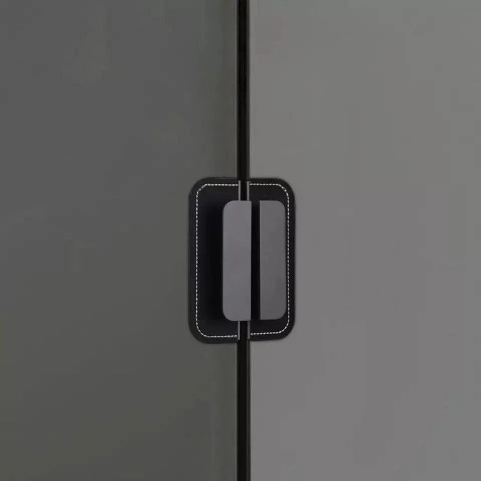 The Mantara L-0007 Geometry Leather Handle is a modern grey and black handle in matte finish, ideal for doors, cabinets, and wardrobes.
