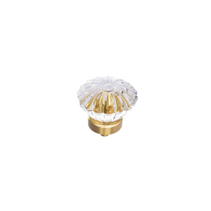 The Mantara C-0010 is a modern crystal knob in white/brass, ideal for kitchens, drawers, and cabinets.