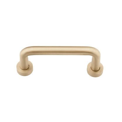 The Gleam Handle by Mantara B-0106 is a brushed brass handle in gold, ideal for furniture, wardrobes, and kitchens.