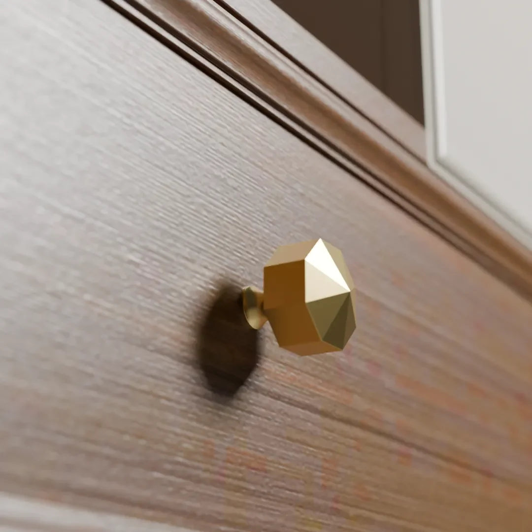 The Mantara B-0006 Fiore Knob is a modern brass knob in dark gold with a brushed finish, ideal for wardrobes, drawers, and cabinets.