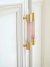 The Mantara C-0014-96 Haze Handle is a modern crystal and brass handle in pink, ideal for cabinets and wardrobes.