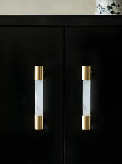 The Mantara C-0014-96 Haze Handle is a modern crystal and brass handle in white, ideal for cabinets and wardrobes.