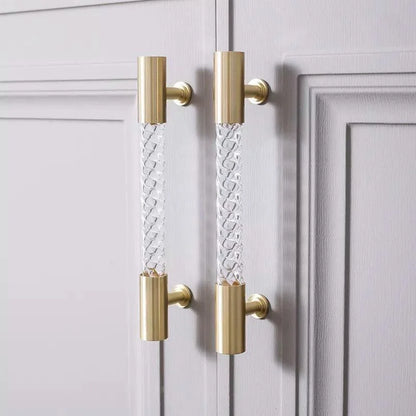The Mantara A-0012 Helix Handle is a modern white brass and acrylic handle with polished + brushed stem, ideal for doors, cabinets, and wardrobes.