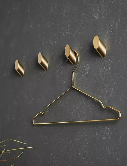 Mantara Hexa Hook B-0091 is a modern brushed brass wall hook in gold, perfect for bathrooms, bedrooms, and living areas.