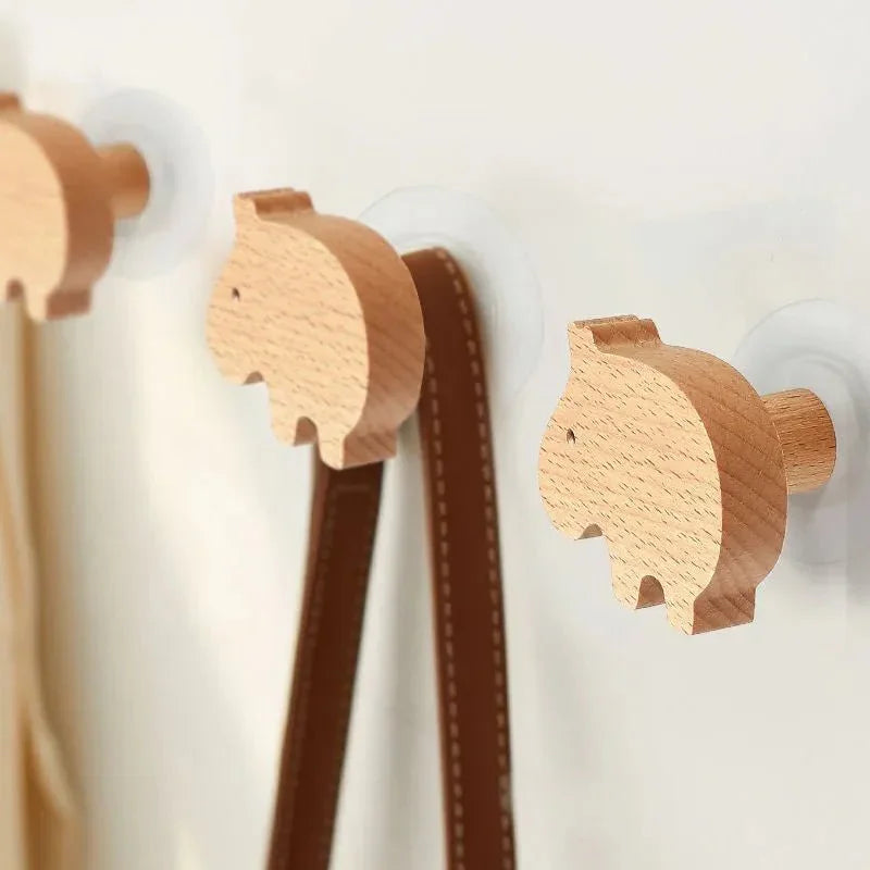 Mantara Hippo Wooden Knob/Hook W-0024 is a modern wood knob and wall hook in brushed beige finish, ideal for kids’ rooms, cabinets, and wardrobes.