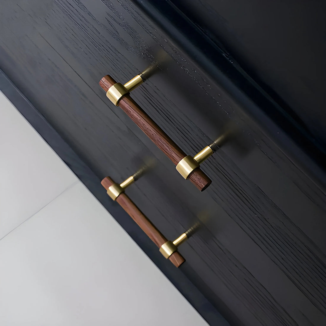 Mantara Holt Handle W-0010 is a modern walnut wood & brass handle in dark brown with brushed finish, ideal for wardrobes & drawers.
