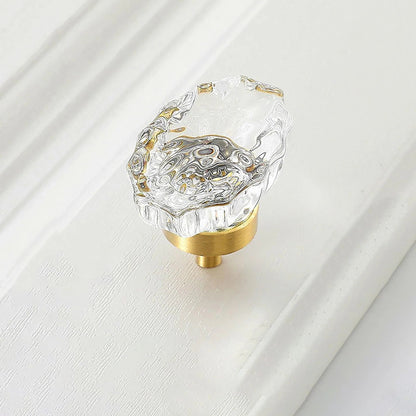 The Mantara C-0009 is a modern artificial crystal + brass knob in white/brass, ideal for kitchens and cabinets.