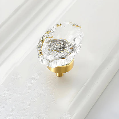 The Mantara C-0009 is a modern artificial crystal + brass knob in white/brass, ideal for kitchens and cabinets.