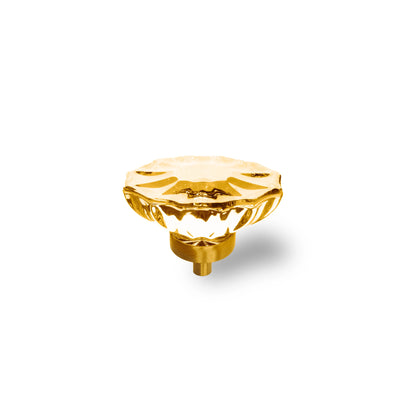 The Mantara C-0009 is a modern artificial crystal + brass knob in champange/brass, ideal for kitchens and cabinets.