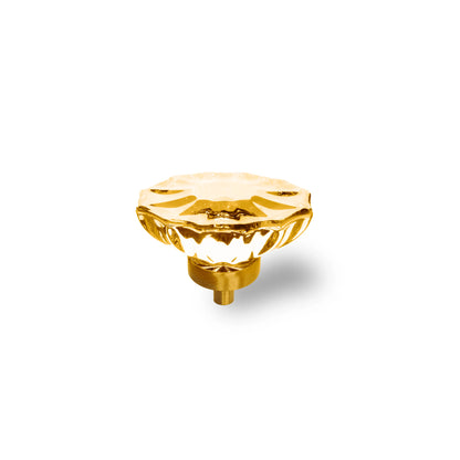 The Mantara C-0009 is a modern artificial crystal + brass knob in champange/brass, ideal for kitchens and cabinets.
