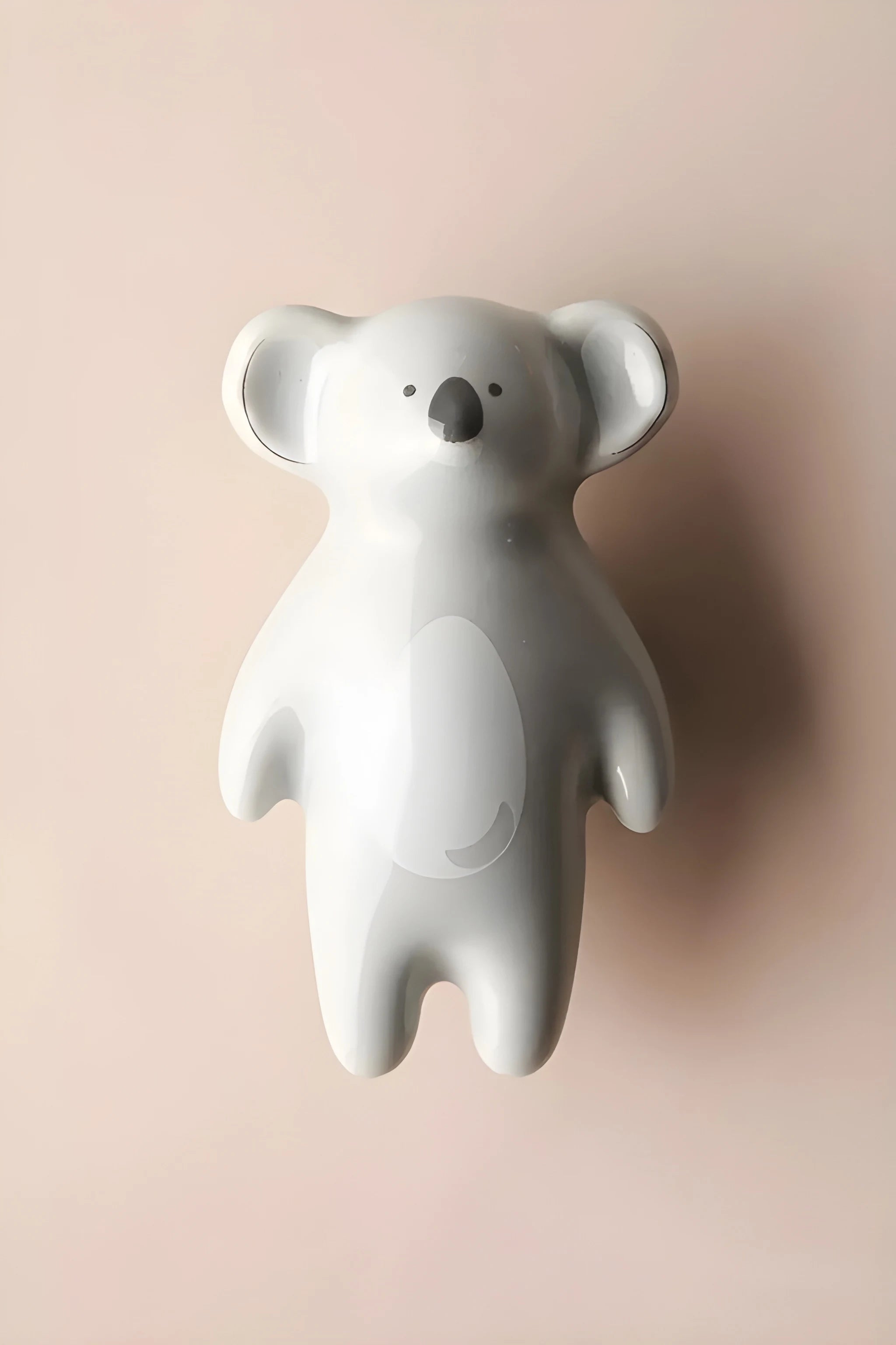 The Mantara CR-0001-Koala Koala Knob is a modern grey ceramic knob with a polished finish, ideal for wardrobes, drawers, and kids&