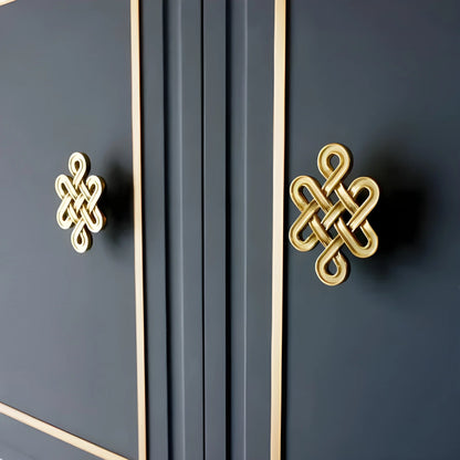 The Lattice Hook by Mantara B-0116 is a modern brass wall hook in gold with a brushed finish, ideal for kitchens and bedrooms.