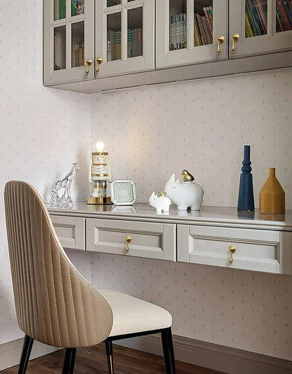 The Mantara B-0041 Legacy Drop Knob is a modern brushed brass knob in gold, ideal for furniture, cabinets, bedrooms, and kitchens.