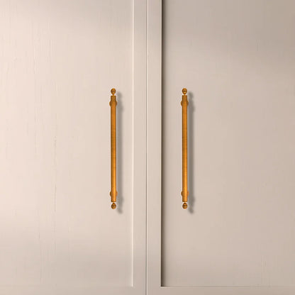The Mantara B-0122 Aureate Handle is a modern brass handle in bronze with a brushed finish, ideal for kitchens and dressers.